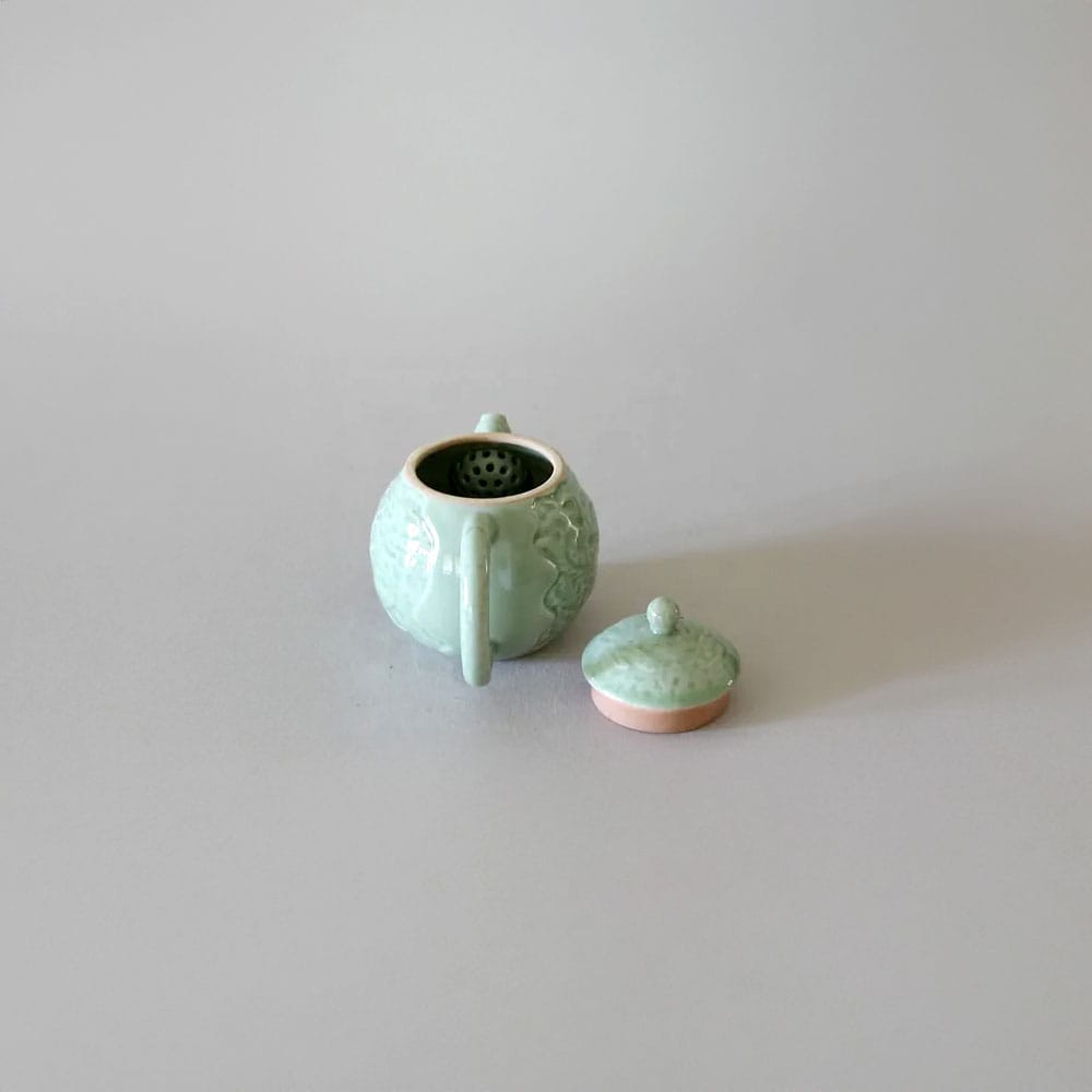 
                  
                    Dragon and Phoenix Celadon Teapot Set with 2 Cups
                  
                