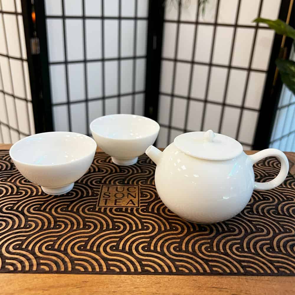 
                  
                    Chinese Petite Porcelain Teapot and Two Cup Set
                  
                