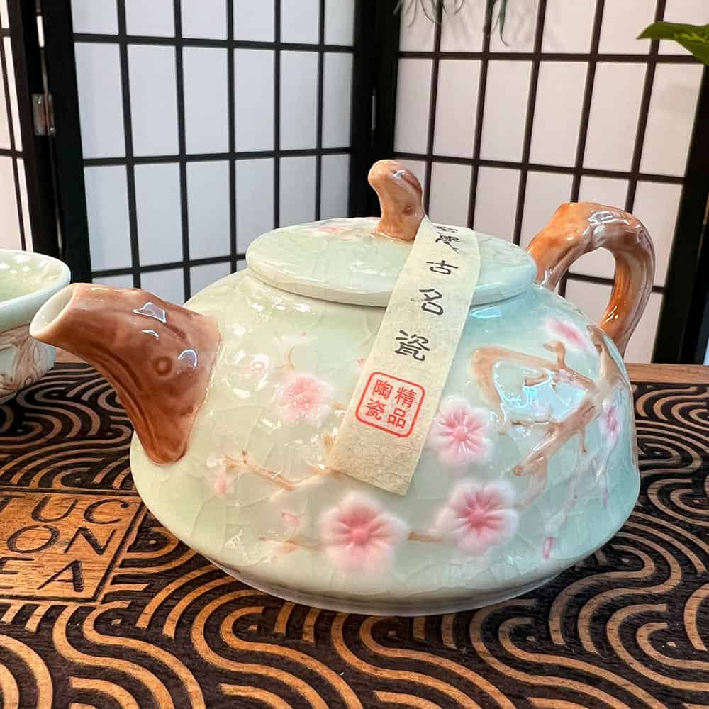 
                  
                    Porcelain Plum Teapot with 4 Cups
                  
                