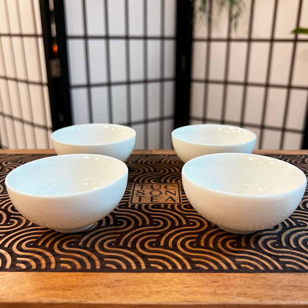 
                  
                    White Porcelain Tea Cups, Set of 4
                  
                